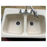 Cast-iron sink with new faucet