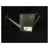 Galvanized watering can