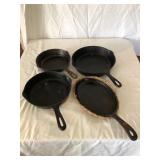 Four cast-iron skillets1 Wagner Four cast-iron skillets1 Wagner