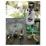 Three fishing poles, yard sprinklers, garden Three fishing poles, yard sprinklers, garden