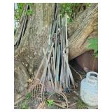Assorted yard tools, bench Assorted yard tools, bench