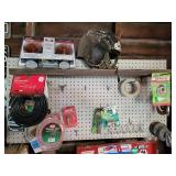 Old helmet, contents of pegboard, craftsman tool Old helmet, contents of pegboard, craftsman tool
