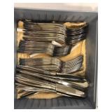 Silverware and blue box Silverware and blue box