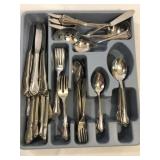 Silverware and blue plastic tray Silverware and blue plastic tray