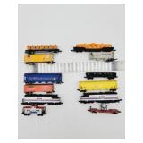 12 pieces assorted rail cars, including 2 Amtrak 12 pieces assorted rail cars, including 2 Amtrak