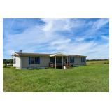 Country Home on 1.65 +/- acres in Rich Hill, MO