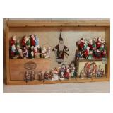 CURIO CABINET WITH SMALL SANTA FIGURINES CURIO CABINET WITH SMALL SANTA FIGURINES