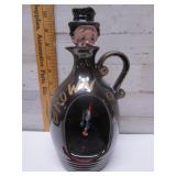 BROWN JUG MUSIC BOX DECANTER