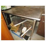 STAINLESS STEEL TABLE WITH CONTENTS ON BOTTOM