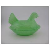 GREEN HEN ON THE NEST