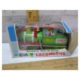 TIN TOY JAPAN WIND-UP LOCOMOTIVE