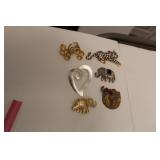 BROOCHES