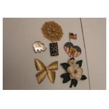 BROOCHES