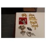 BROOCHES