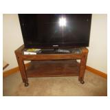ROLLING WOODEN TV STAND