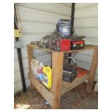 TABLE LOT- BATTERY CHARGER, CHEMICALS, & DROP