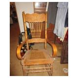 ANTIQUE OAK PRESS BACK ROCKING CHAIR