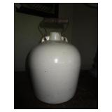 STONEWARE JUG WITH HANDLE - HAS A CHIGGER