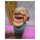 1930s ERA HAND-CARVED MECHANICAL BOTTLE STOPPER