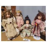 4 Assorted Dolls