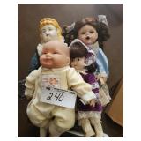 4 Assorted Dolls, One with Glass Face