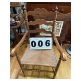 Wood chair with arms with cane bottom