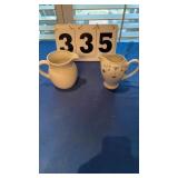 2 small pitchers