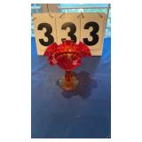 small red ruffled glass dish
