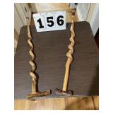 2 walking sticks (canes)