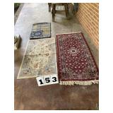3 small rugs