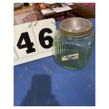 Green glass cookie jar metal lid