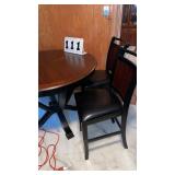 Wood table 48" wide x 36" tall and 4 chairs