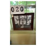 framed photograph in the image appears to show