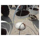 SMALL CAST IRON POT ON A STEEL WHEEL, HANGING SMALL CAST IRON POT ON A STEEL WHEEL, HANGING