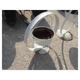 SMALL CAST IRON POT ON A STEEL WHEEL, HANGING SMALL CAST IRON POT ON A STEEL WHEEL, HANGING