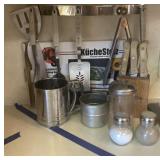 Utensils, knives, salt and pepper, etc.