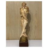 Plaster Couple Empbracing Statue
