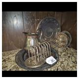 Silver Plated Pitcher, Toast Rack, and Trays