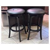 2 Black Swivel Bar Stools with Decorative Backs