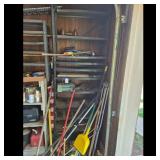 Storage Shelving Unit with Tools and Garden Equip