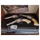 Contents of Shelf, Toy Pistols, Christmas Decor