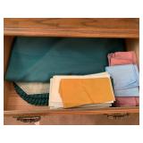 Contents of two drawers in china cabinet