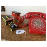 Red rotary phone, 2 Coke trucks Red rotary phone, 2 Coke trucks