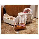 3 toy baby cradles with contents 3 toy baby cradles with contents