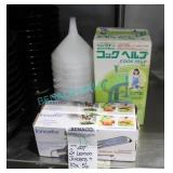 LOT,2X LEMON JUICERS +10X 5"D PLASTIC FUNNELS, ETC