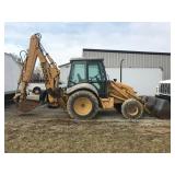 New holland 655E backhoe