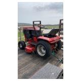 Wheel horse riding mower