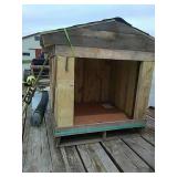 Wooden dog house