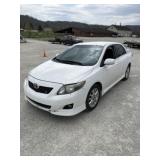(T) 2010 Toyota Carolla