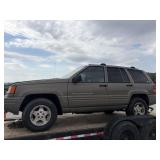 1999 jeep grand Cherokee Rinds and drives.